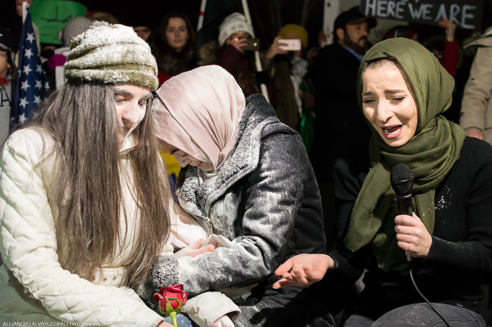 Meriem Abou-Ghazaleh recreates what life is like for Aleppo civilians during a vigil outside the White House on Dec. 16.